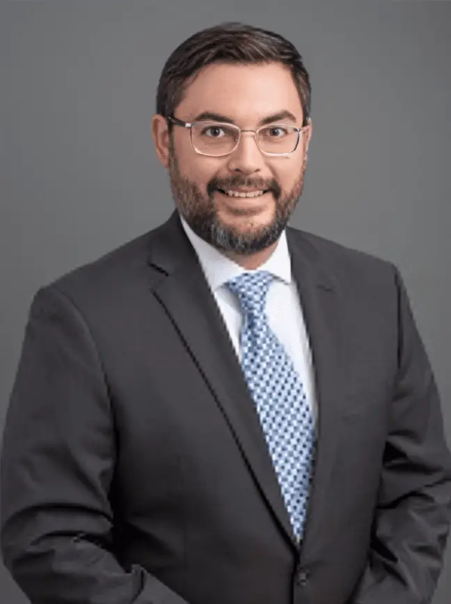 LucianaRios_1749 Man in suit with glasses and beard.